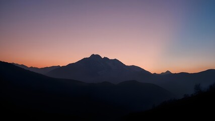 Majestic Mountain Silhouette at Twilight with Gradient Sky