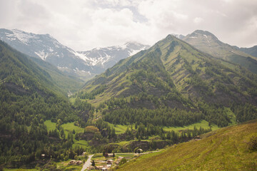 Fototapeta premium a view into the valley of the alpine landscape . view of the alpine valley in northern Italy.