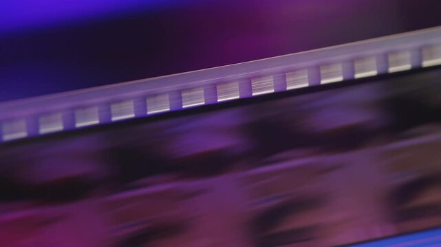 35mm Film strip in a cinema - close up shot film cels of a movie