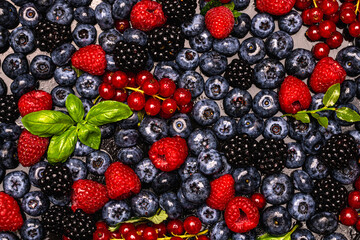 Background of fresh berries. Berry fruit. Blueberries, blackberries and raspberries. Vitamins in natural products. Berries.