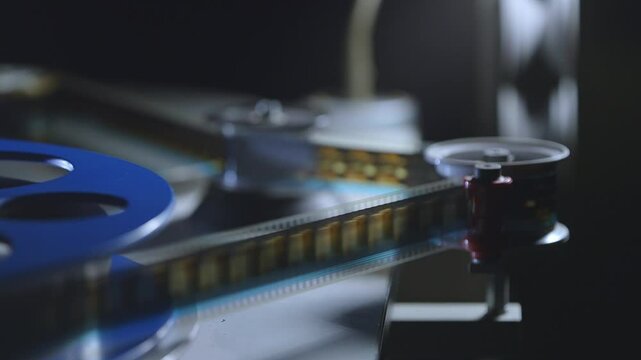 35mm Film strip in a cinema - close up shot film cels of a movie