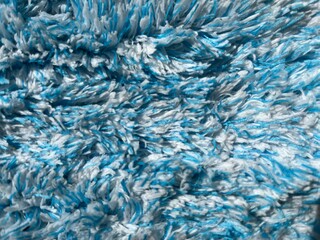 Blue and white long pile carpet