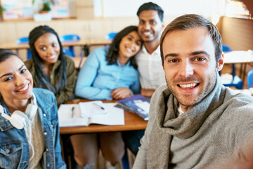 Fototapeta premium Education, selfie and smile with student friends in class on college or university campus together. Diversity, portrait and happy with learner people in classroom at school for future development