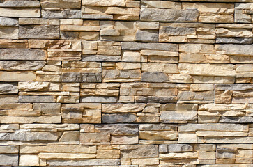 Close-Up of Stacked Stone Masonry Wall with Textured Natural Colors