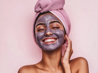 beauty photo of a young indian girl smiling wearing a cosmetic face mask on her face and a towel on her head portrait photo on a light pink background studio soft light style beauty photo
