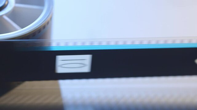 35mm Film strip in a cinema - close up shot film cels of a movie