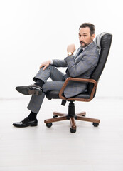 businessman leader sit in office chair. business success. professional leader ceo. businessman in...