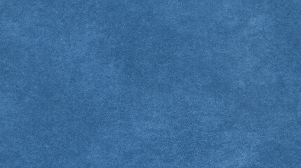 Fototapeta premium a seamless texture of slightly textured colored paper in blue jeans color