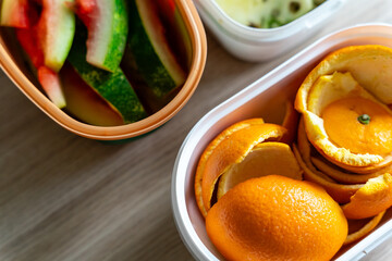 a variety of fruits and vegetables food waste on-a-yellow surface