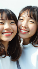 Close up of two smiling women's faces