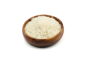 Raw white rice on wooden background. Long uncooked rice in wooden plate. Natural organic food. Traditional Asian cereal culture.	
