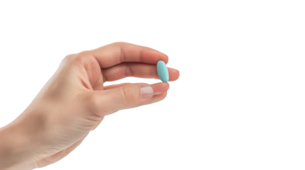Hand holding the pill isolated on white background