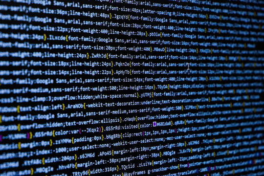 Software source code. Programming code. Programming code on computer screen. Developer working on program codes in office. Source code
