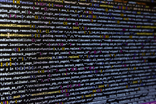 Software source code. Programming code. Programming code on computer screen. Developer working on program codes in office. Source code