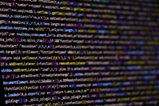 Software source code. Programming code. Programming code on computer screen. Developer working on program codes in office. Source code