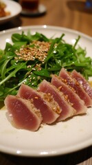 Elegant Seared Tuna Slices with Sesame Seeds on White Plate. Gourmet Seafood Dish for Fine Dining Restaurants, Health-Conscious Menus, and Culinary Marketing. Perfect for Upscale Dinners, Date Nights,