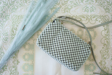 Stylish and Chic Checkered Purse paired elegantly with a Light Blue Umbrella for any occasion