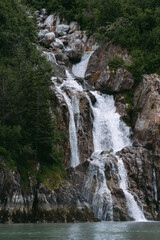 Waterfall in Tracy Arm fjord south of Juneau Alaska in Tongass National Forest during summer