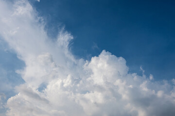 beautiful brilliant and dynamic clouds over city for background, abstract texture for presentation template, sky blue wallpaper, concept of climate change