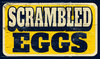 Obraz premium Aged and worn scrambled eggs sign on wood
