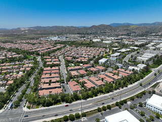 Aerial view of middle class community identical condominium houses, Lake Forest, South California,...