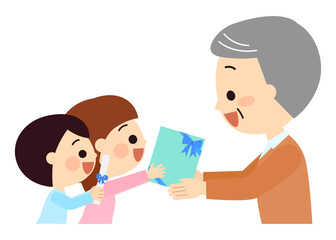 おじいさんへ贈り物を渡す子供達