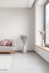 Empty living room in a modern property with a large window providing natural lighting and minimal furniture. Residential interior design composition in neutral colors.