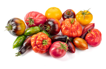 Different tomatoes isolated on white background.