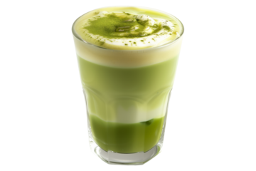 Cup of rich creamy matcha or chai latte crowned with fluffy whipped cream and a sprinkle of cinnamon isolated on white background with clipping path. The warm beverage for cozy afternoon