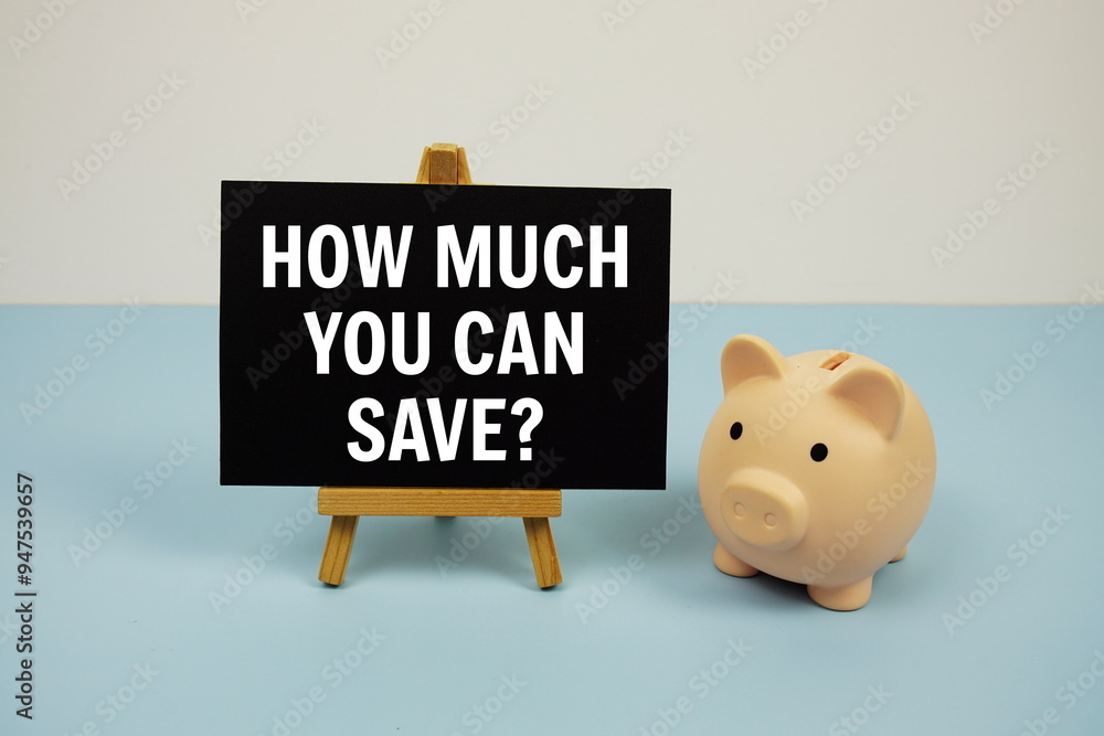 Poster how much you can save? text quotes text on paper card and easel standing with piggy saving on blue b