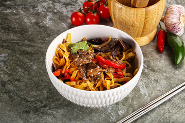 Asian wok with noodle, vegetables and beef