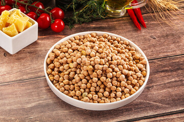 Dry chickpea seeds heap in the bowl