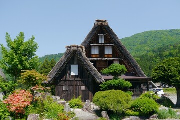 Gassho-zukuri, a special building located in Shirakawa Township, Japan. The Gasshō-style house is characterized by a steeply slanting thatched roof, resembling two hands joined in prayer.