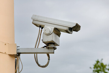 CCTV camera, video security system, lense camera mounted on building facade, advanced surveillance and reliable safety monitoring. Security systems for effective monitoring outdoors