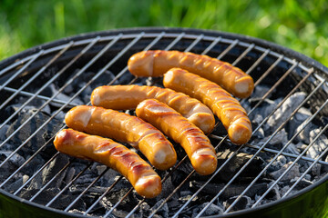sausages on grill