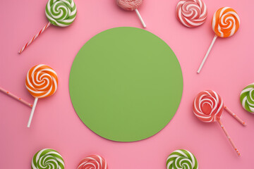 lollipops around green circle on pink background, copy space, creative art modern design hq


