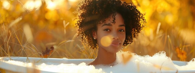 black , african american woman in outdoor bath in blurred autumn background. take care of yourself, unity with nature concept. moments of relax. banner