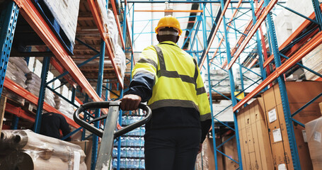 Factory, man and worker pull pallet truck for supply chain, restock inventory or moving freight....
