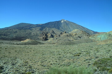 Scenic view of volcanic rock formations in desert during sunny day, Teide National Park, Tenerife