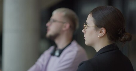 A diverse group of entrepreneurs engages in a dynamic business meeting within a modern office, showcasing their collaborative spirit and innovative approach to business development