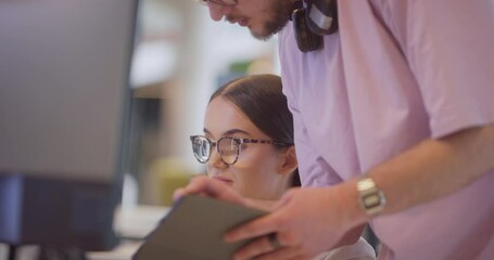 A diverse group of colleagues collaborates in modern office