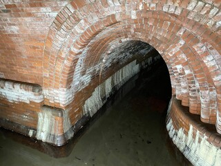 Old brick sewer tunnels connecting