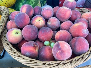 Basket of fresh peaches