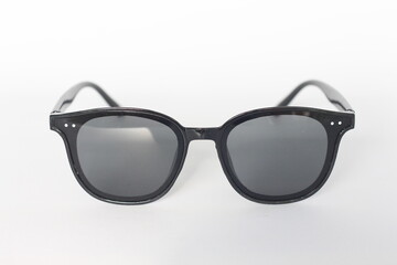 Stylish black sunglasses isolated on white background.