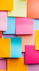 Fototapeta premium An artistic and colorful collection of sticky notes, arranged on a bright and vibrant background