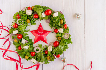 salad in the form of a Christmas wreath