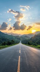 A long road with a beautiful sunset in the background