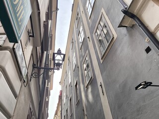 A street lined with colorful houses in Stockholm's historic Gamla Stan district, Sweden