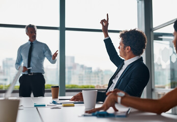 Businessman, meeting and presentation with question for idea, proposal or answer in conference at...