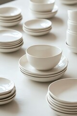 Elegant White Ceramic Dinnerware Set Arranged on a Minimalist Table for Modern Dining